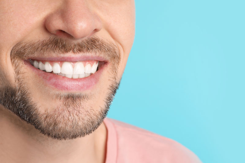 dental patient smiling after gum disease treatment