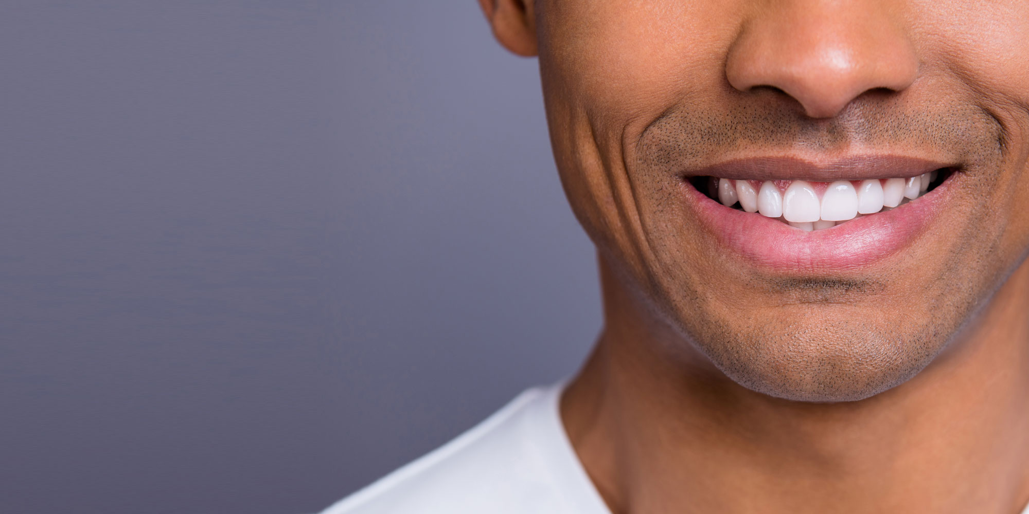 dental patient smiling after procedure.