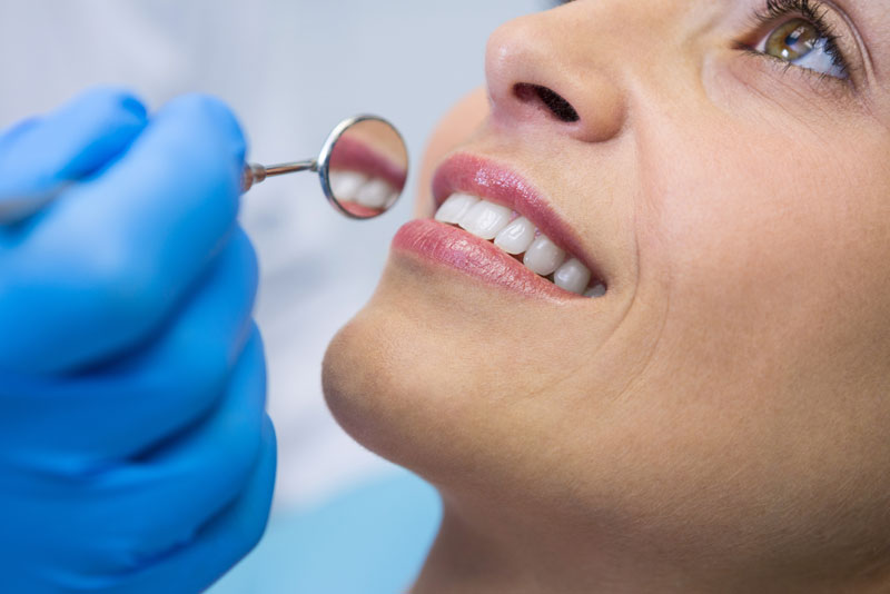 patient undergoing dental cleaning.