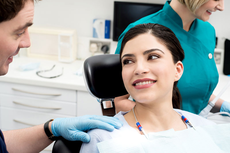 a dental patient getting porcleain veneers.